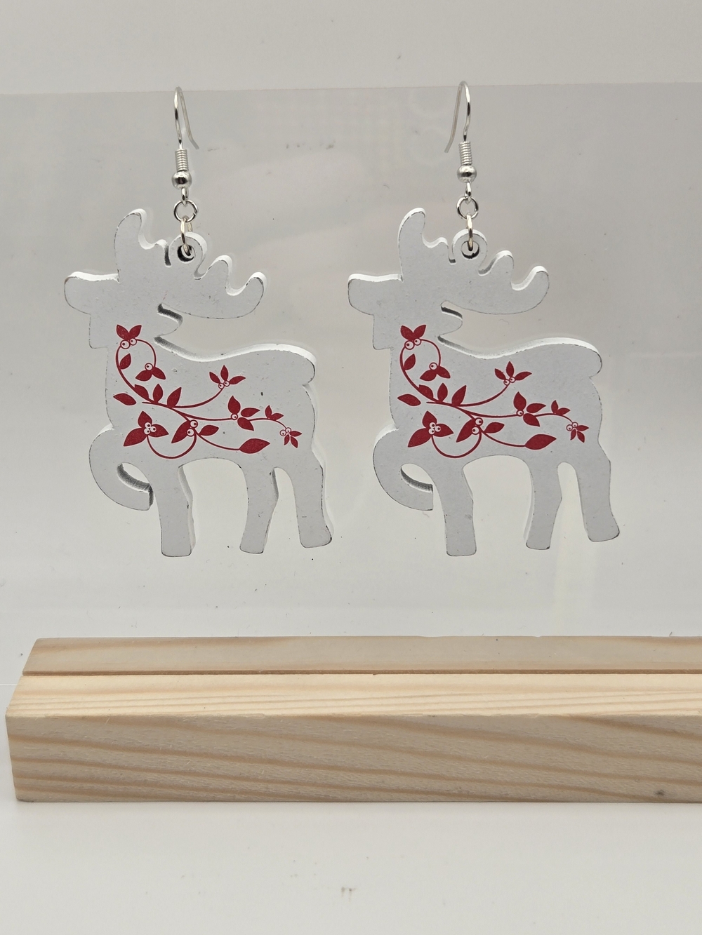 Silver Reindeer Dangle Earrings with Red Floral Accent